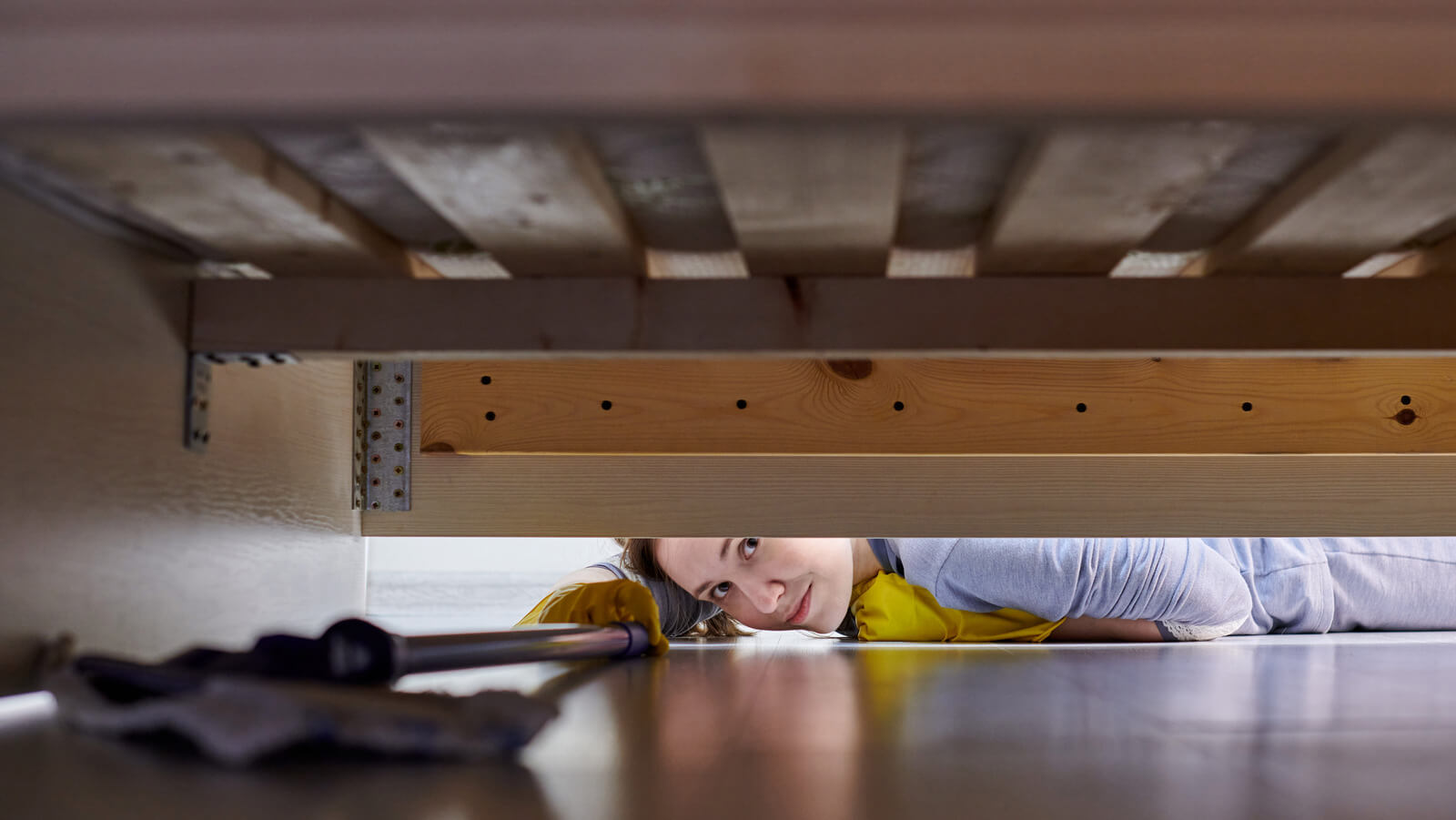 how to clean under a low bed